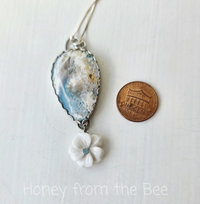 Beach necklace features plume agate set in sterling silver