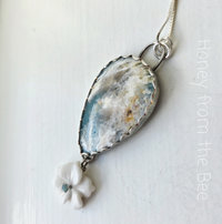 Plume Agate pendant with white flower dangle