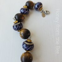 Purple and brown artisan bracelet