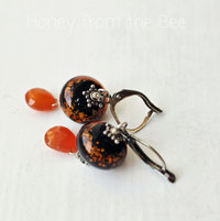 Orange and black earrings