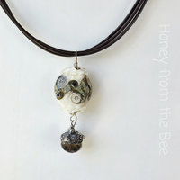 Artisan necklace features lampwork, fine silver and smokey quartz