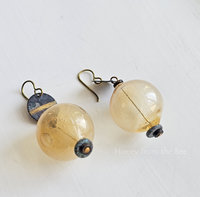 Turquoise beads finish off these yellow boho earrings