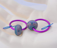 Hoops in fucshia hold lampwork of teal and purple in this pair of artisan earrings