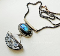 Modern artisan pendant in blue and silver