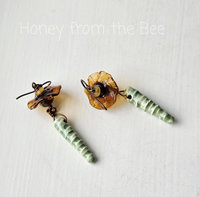 Brown eyed Susan earrings feature lampwork and ceramic