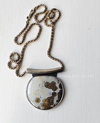 Ocean Jasper necklace in sterling silver with white background and brown orbs