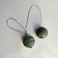 Ball earrings in teal and silver