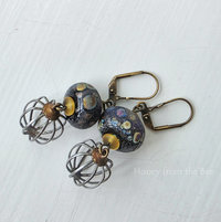 Lampwork earrings in black and yellow with vintage findings