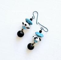 Cowgirl earrings feature lampwork and antique button dangles