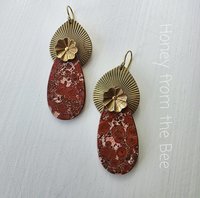 Artisan earrings feature Bird's Eye jasper and vintage brass in floral design
