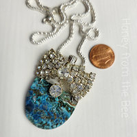 Gemstone and rhinestone necklace in blue and crystals