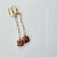 Fossilized coral agate earrings in red and gold