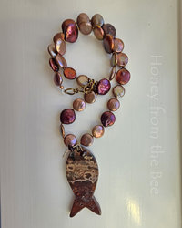 Art necklace in red and rose