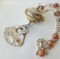 Peach Moonstone necklace with lampwork in cream and sterling silver