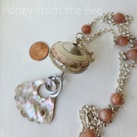 Statement necklace in sterling silver, peach and cream