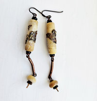 Boho style long dangle earrings in cream and copper.