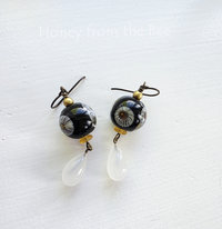 Daisy Lampwork earrings in black and white with yellow