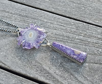 Amethyst pendant set in sterling silver with charoite dangle