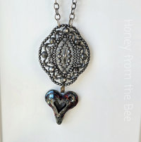 Heart pendant in mixed media