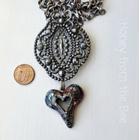 Artisan necklace in silver patina and raku heart