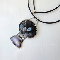 Outer Space inspired necklace featuring art glass in black with purple and blue accents and Casa Grande Agate