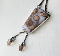 One of a kind artisan necklace features high quality ocean jasper and sunstones set in sterling silver