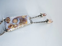 Orange and pale lavender ocean jasper focal in this sterling silver gemstone necklace.