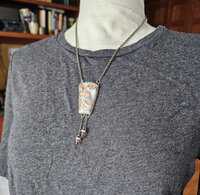 Ocean jasper necklace with sunstone drops set in sterling silver on model.