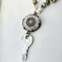 Nature Talisman necklace with mother of pearl and rhyolite