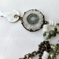 Stalactite and key focal with faceted rhyolite and mother of pearl beads