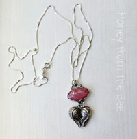 Silver heart pendant with pink cabochon