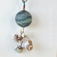 Aqua lampwork necklace with found shells