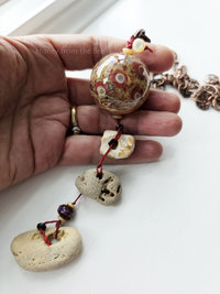 Lampwork artisan necklace with hag stones in red and off white