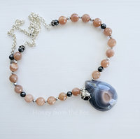 Peach and grey gemstone necklace features Botswana Agate and peach moonstone