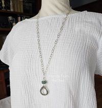 Tunic length pendant on model