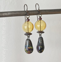 Boho style earrings feature lampwork and ceramic