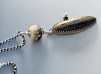 Sterling silver artisan pendant with raku ceramic cabochon