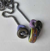 Lori Lochner lampwork focal on sterling silver chain