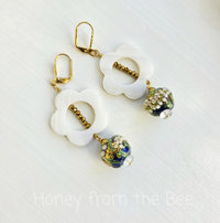 Floral lampwork earrings in navy and white