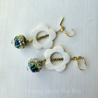 Blue and white earrings in a floral theme