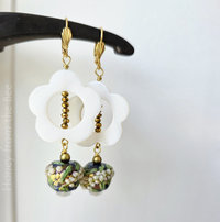Sparkly flower earrings in navy blue and white with touch of green