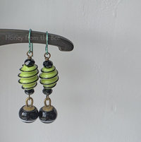 Fun earrings with antique button dangles