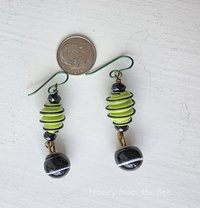 Artisan earrings in green and black