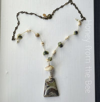 Boho style necklace features Mushroom Rhyolite and a mushroom lampwork bead