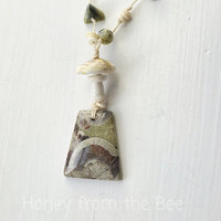 Mushroom necklace with mushroom rhyolite and mushroom lampwork in green and white