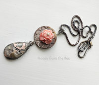 Lotus flower in peach against grey mother of pearl antique button with grey and peach gemstone drop pendant necklace