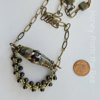 Boho necklace in browns and brass