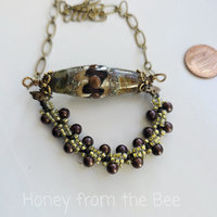 Lampwork necklace in brown with beadwoven accent
