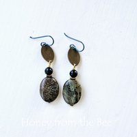 Green and darkened brass earrings feature moss agate and snakeskin jasper