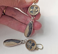 Antique perfume buttons are the perfect accent to the gemstone dangles